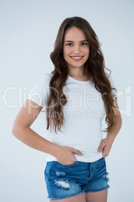 Happy woman in white t-shirt and hot pants