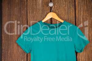 Turquoise t-shirt on hanger