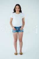 Happy woman in white t-shirt and hot pants