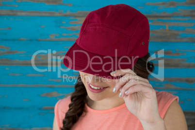 Woman in red cap