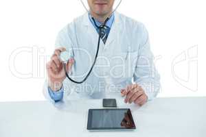Doctor examining with stethscope