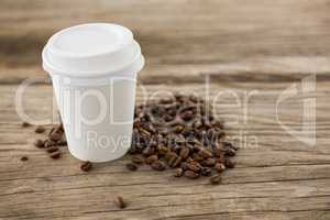 Coffee beans with disposable coffee cup