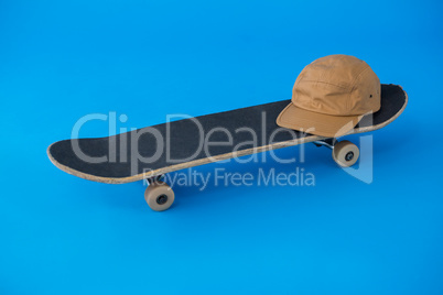 Cap on skateboard