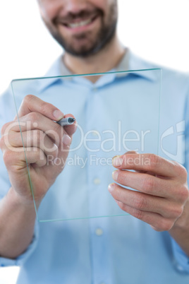 Mid section of man using futuristic digital tablet