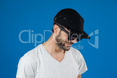 Man in cap and sunglasses