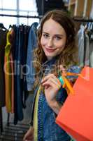 Woman doing shopping at clothes store