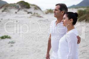 Couple standing on beach