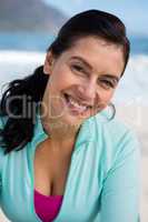 Smiling woman at the beach