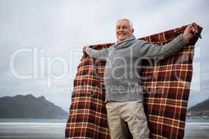 Senior man enjoying on beach