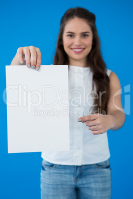 Woman holding a blank placard