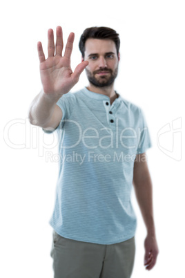 Man pretending to touch an invisible screen