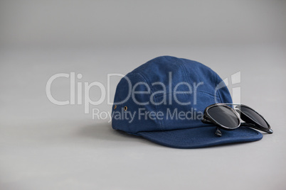 Blue cap with sunglasses