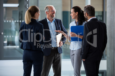 Happy businesspeople having a conversation