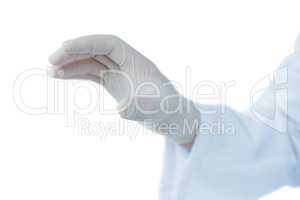 Male doctor gesturing against white background