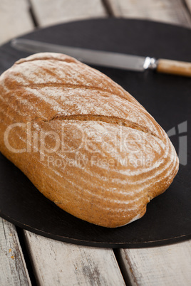 Bread loaf on cutting board