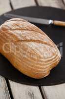 Bread loaf on cutting board