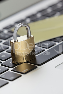 Metallic lock with smart card on laptop