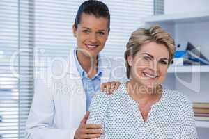 Portrait of a female doctor and patient