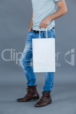 Man holding shopping bag