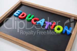 Letter education block on slate