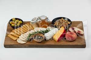Various food items on wooden board