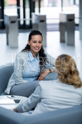 Two businesswomen having a conversation