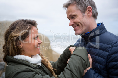 Romantic couple embracing on beach