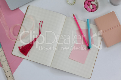 Diary, bookmark, ruler, ribbon, pencil and sticky notes