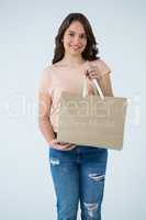 Woman holding shopping bag