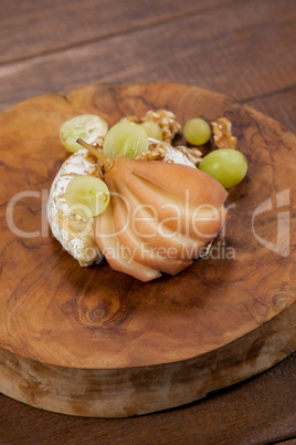 Cheese with dried fruit and fruits