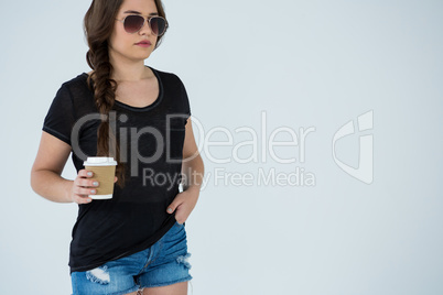 Woman in black t-shirt and hot pants