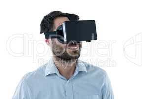 Smiling man using virtual reality headset