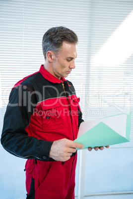 Paramedic reading medical report