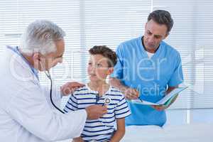 Doctor examining the patient