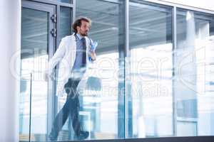 Doctor rushing in corridor