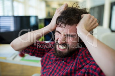 Frustrated business executive at desk