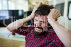 Frustrated business executive at desk