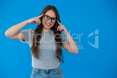 Happy woman in grey t-shirt and spectacles