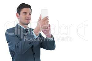 Businessman using futuristic mobile phone