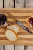 Bread with jam and knife