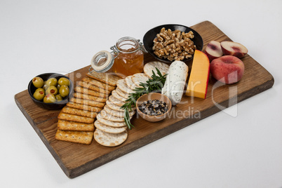 Various food items on wooden board