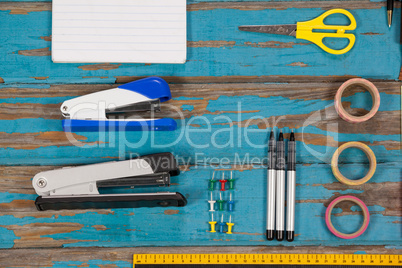Notepad, stapler, pins, sellotapes, ruler and pens