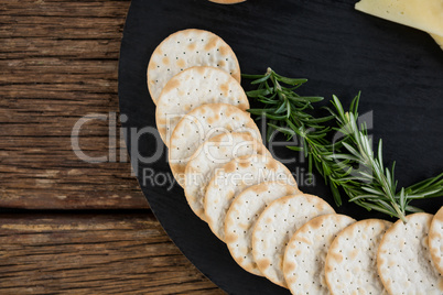 Nacho chips and rosemary herbs on plate
