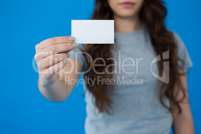 Woman holding a small blank placard