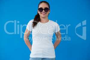 Happy woman in white t-shirt and sunglasses