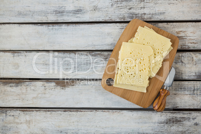 Slices of cheese with knife