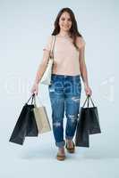 Beautiful woman carrying shopping bags