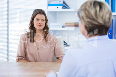 Patient consulting a doctor