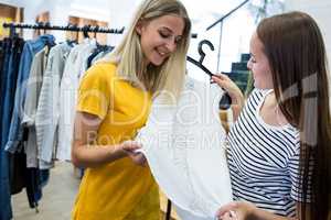 Women doing shopping at clothes store