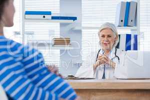 Pregnant patient consulting a doctor